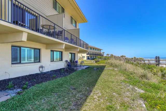 a view of a lake with a yard
