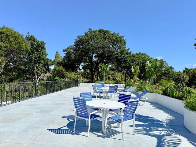 a kitchen with a stove top oven sink and cabinets