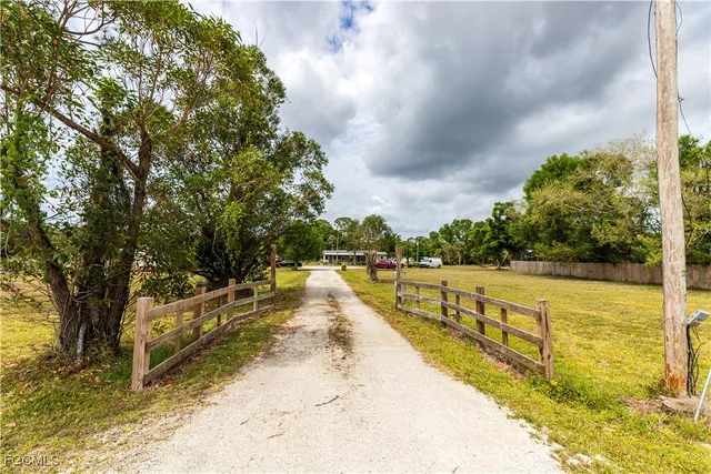 a view of a swimming pool with an outdoor seating
