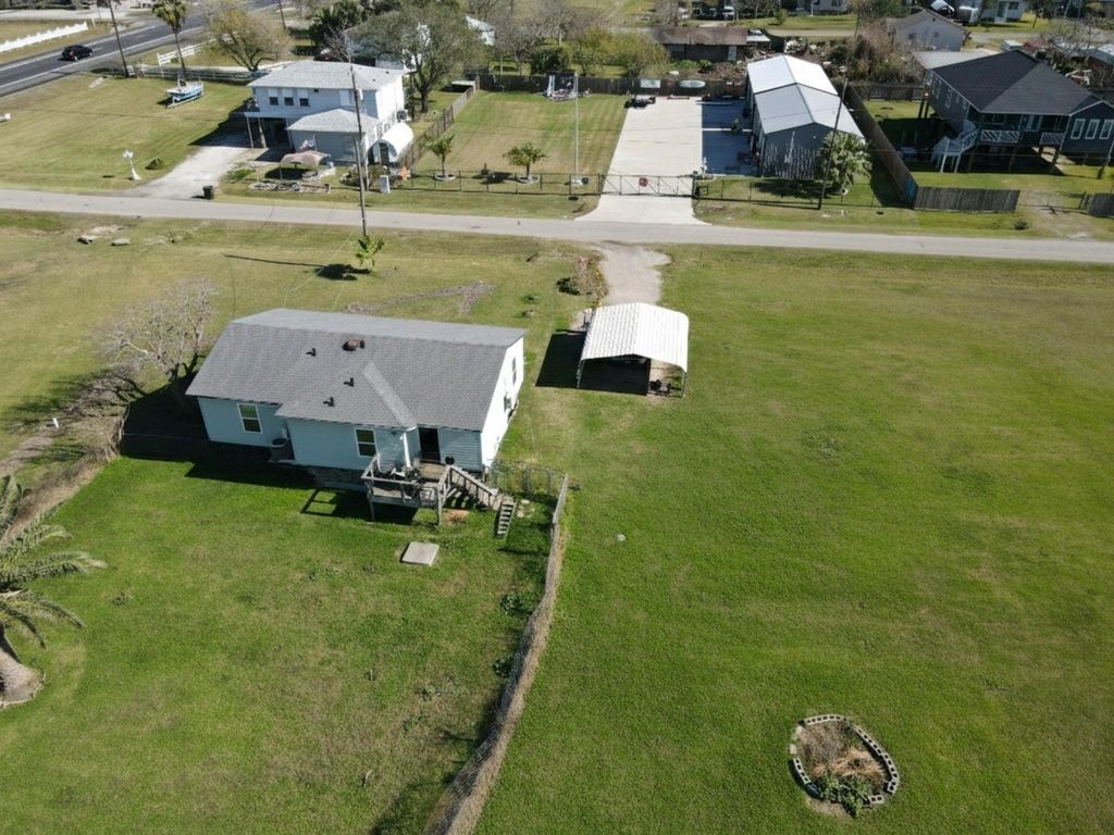 230 22nd Street Dickinson, TX 77539 - Photo 15 of 18 an aerial view of residential houses with outdoor space