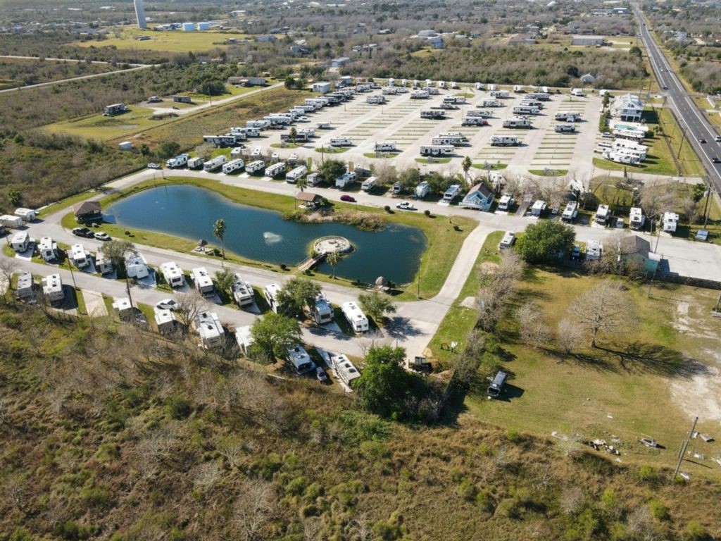 230 22nd Street Dickinson, TX 77539 - Photo 6 of 18 an aerial view of residential houses with outdoor space
