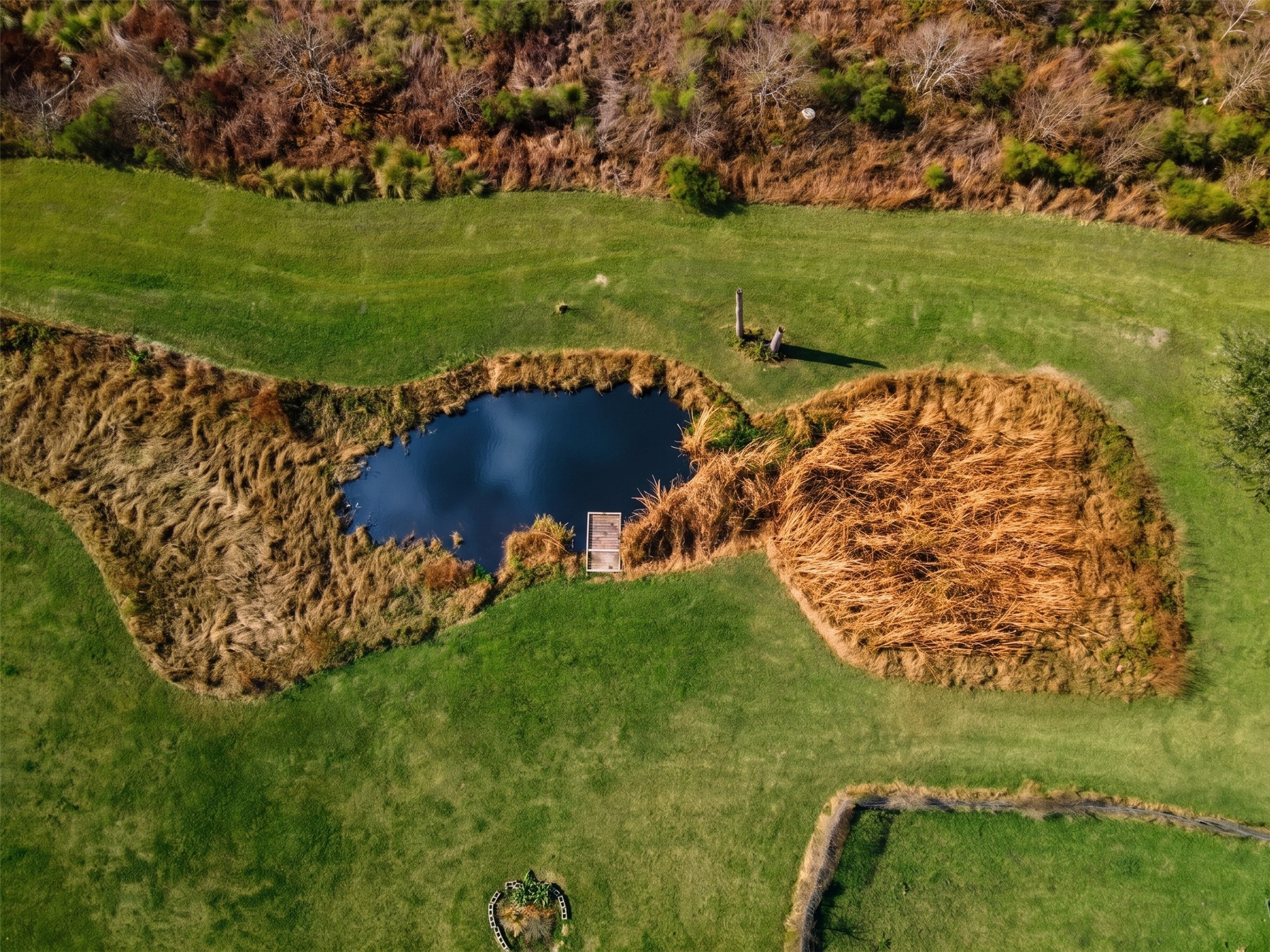 230 22nd Street Dickinson, TX 77539 - Photo 10 of 18 a view of a golf course with a garden