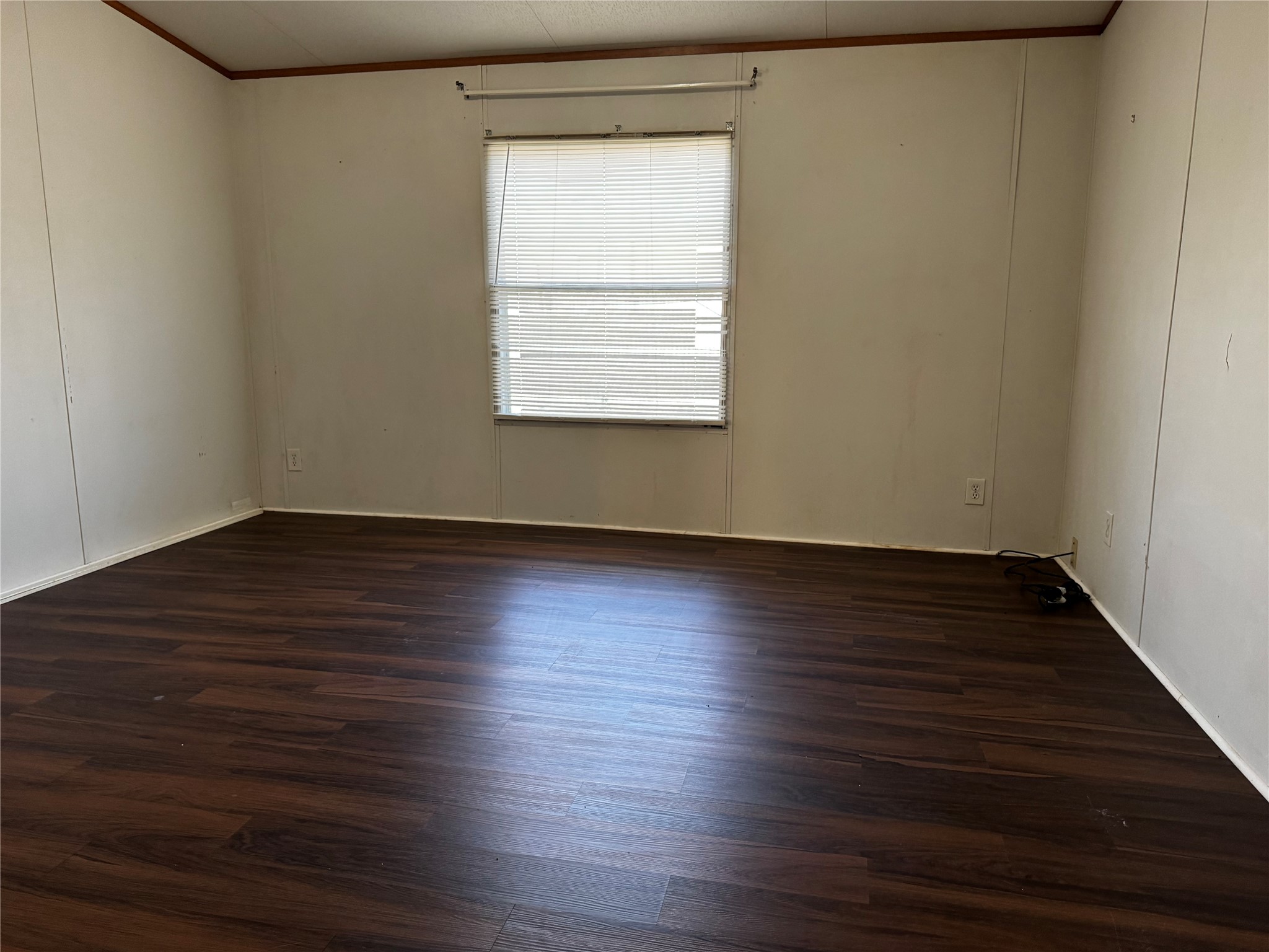 15930 Boss Gaston Road Sugar Land, TX 77498 - Photo 14 of 20 a view of an empty room with wooden floor and a window