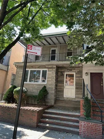 a front view of a house with yard