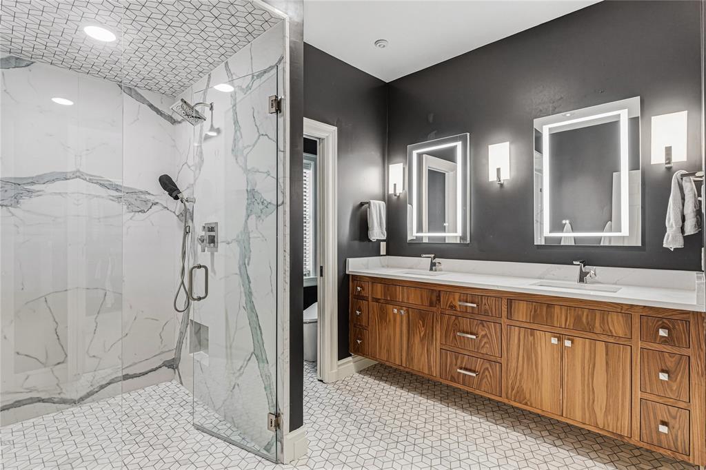 3201 Edward Drive Waco, TX 76708 - Photo 8 of 40 a spacious bathroom with a double vanity sink a mirror and a shower