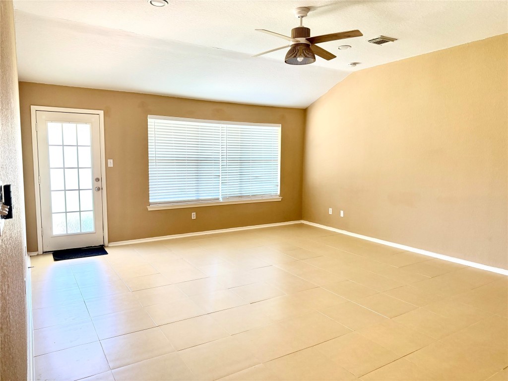 23023 Canal Road Richmond, TX 77406 - Photo 13 of 30 a view of an empty room with a window