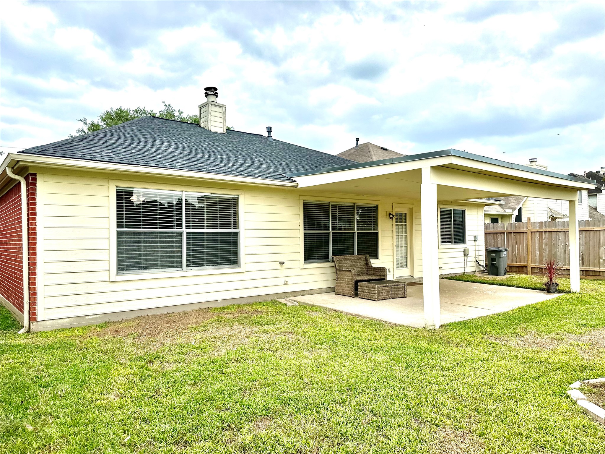 23023 Canal Road Richmond, TX 77406 - Photo 26 of 30 a view of a house with a yard and sitting area
