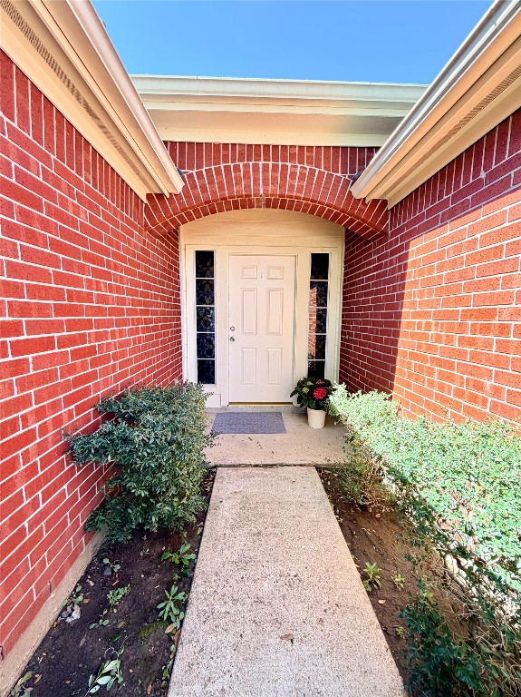 23023 Canal Road Richmond, TX 77406 - Photo 4 of 30 a front view of a house with a yard