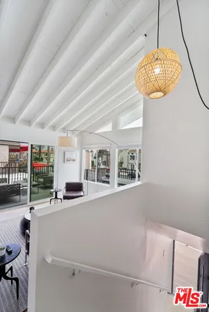 a room with gym equipment and a large window