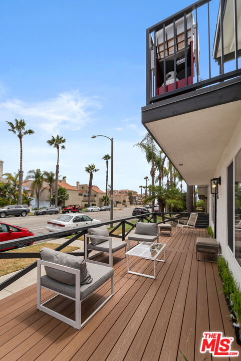 213 17th Street, Unit A Huntington Beach, CA 92648 - Photo 5 of 31 wooden view of outdoor space with seating area