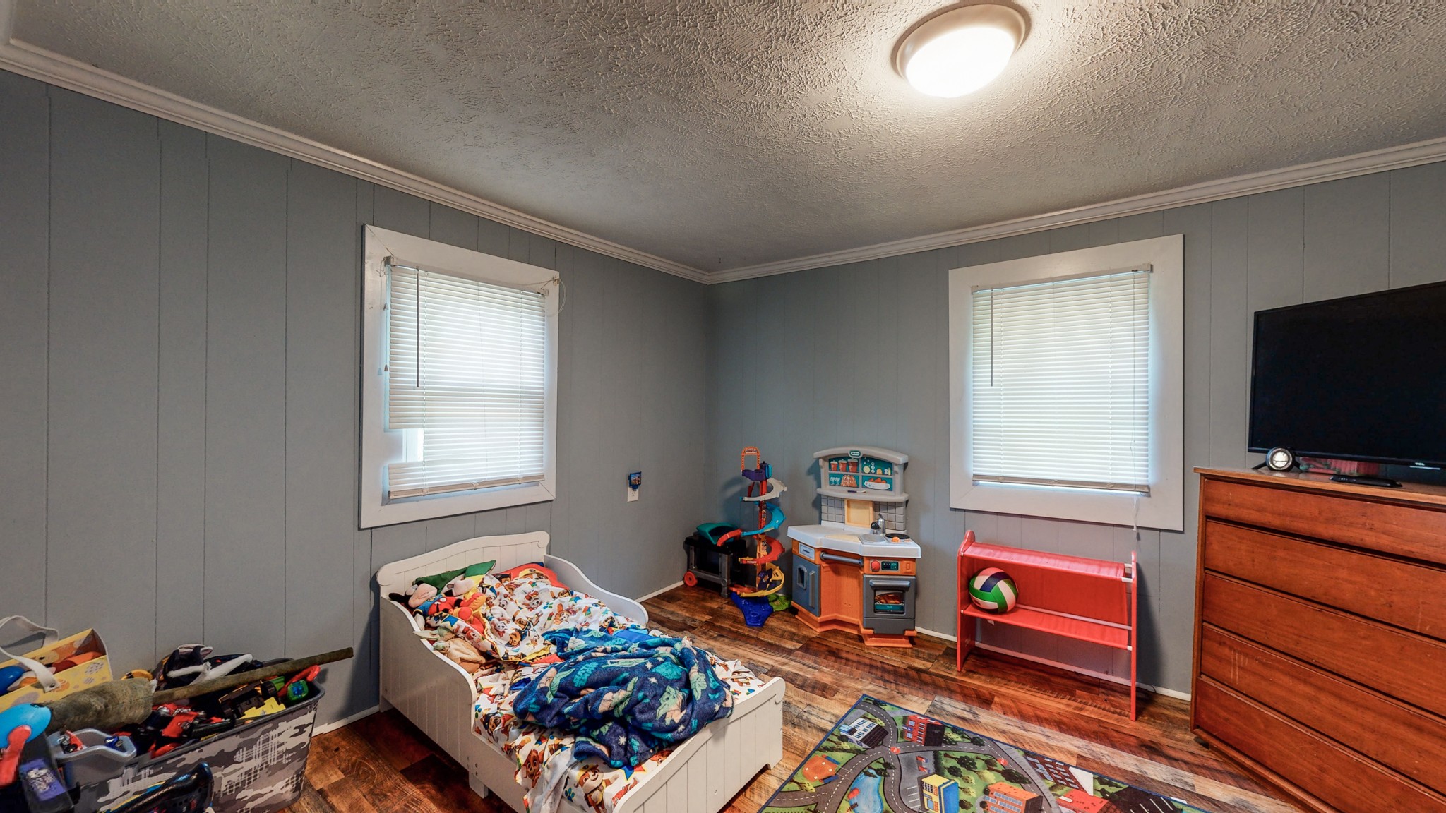 2977 Old Stewart Road Tennessee Ridge, TN 37178 - Photo 19 of 40 a room with toys and flat screen tv