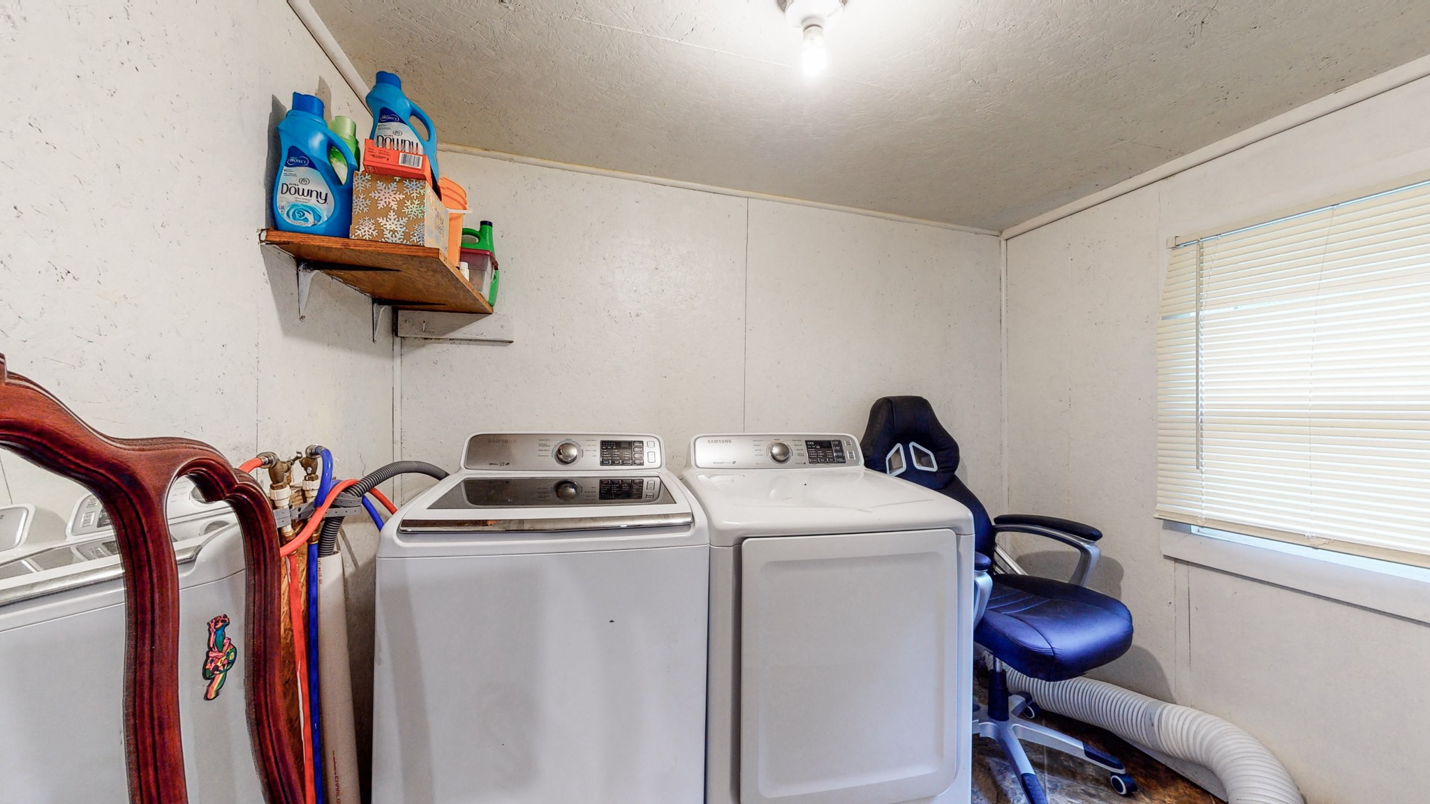 2977 Old Stewart Road Tennessee Ridge, TN 37178 - Photo 26 of 40 a room with storage and utility