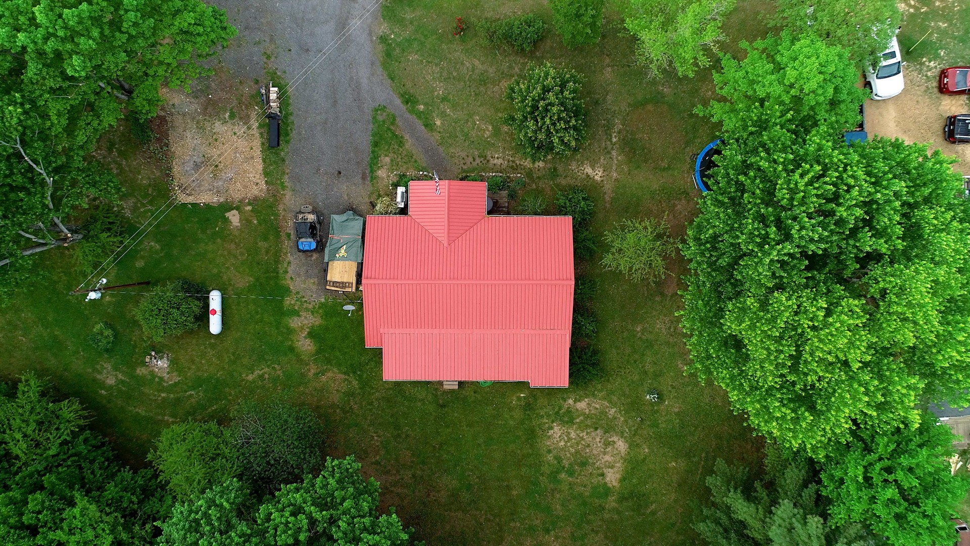 2977 Old Stewart Road Tennessee Ridge, TN 37178 - Photo 37 of 40 an aerial view of residential house with outdoor space and trees all around