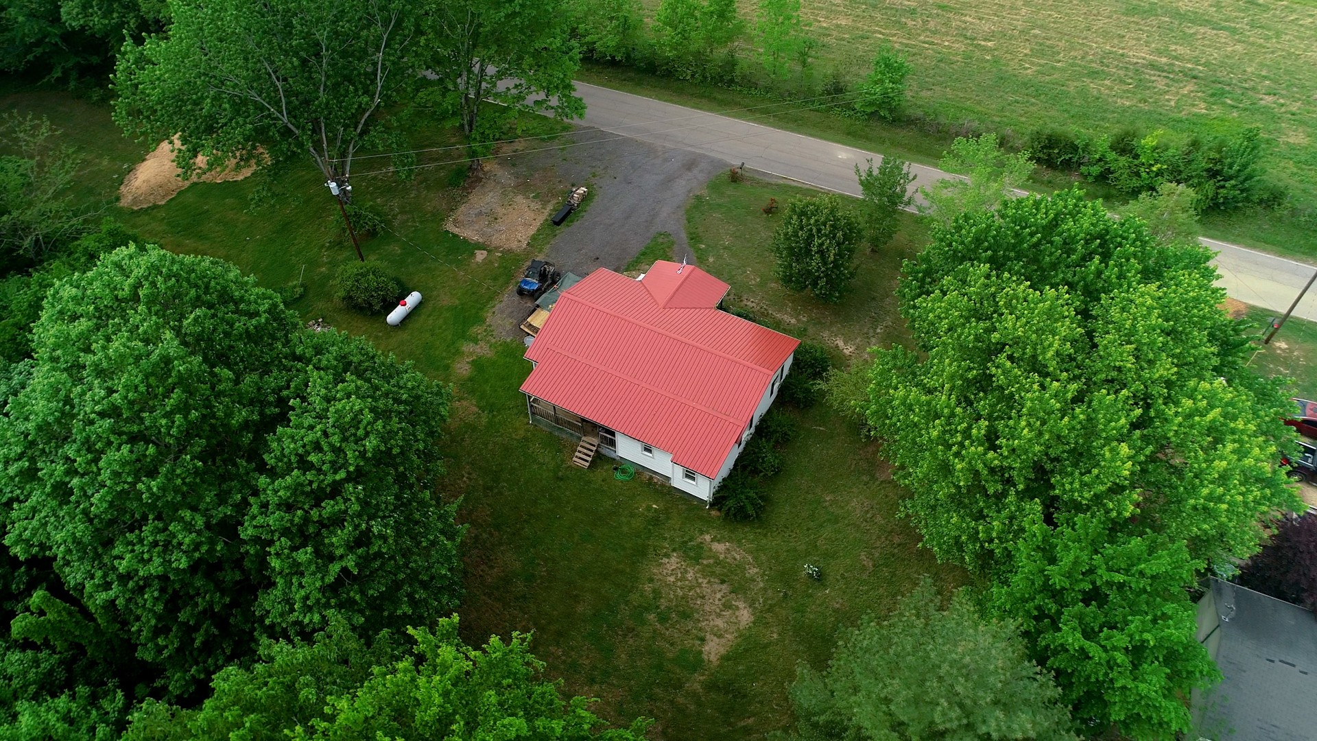2977 Old Stewart Road Tennessee Ridge, TN 37178 - Photo 38 of 40 an aerial view of a house with a yard