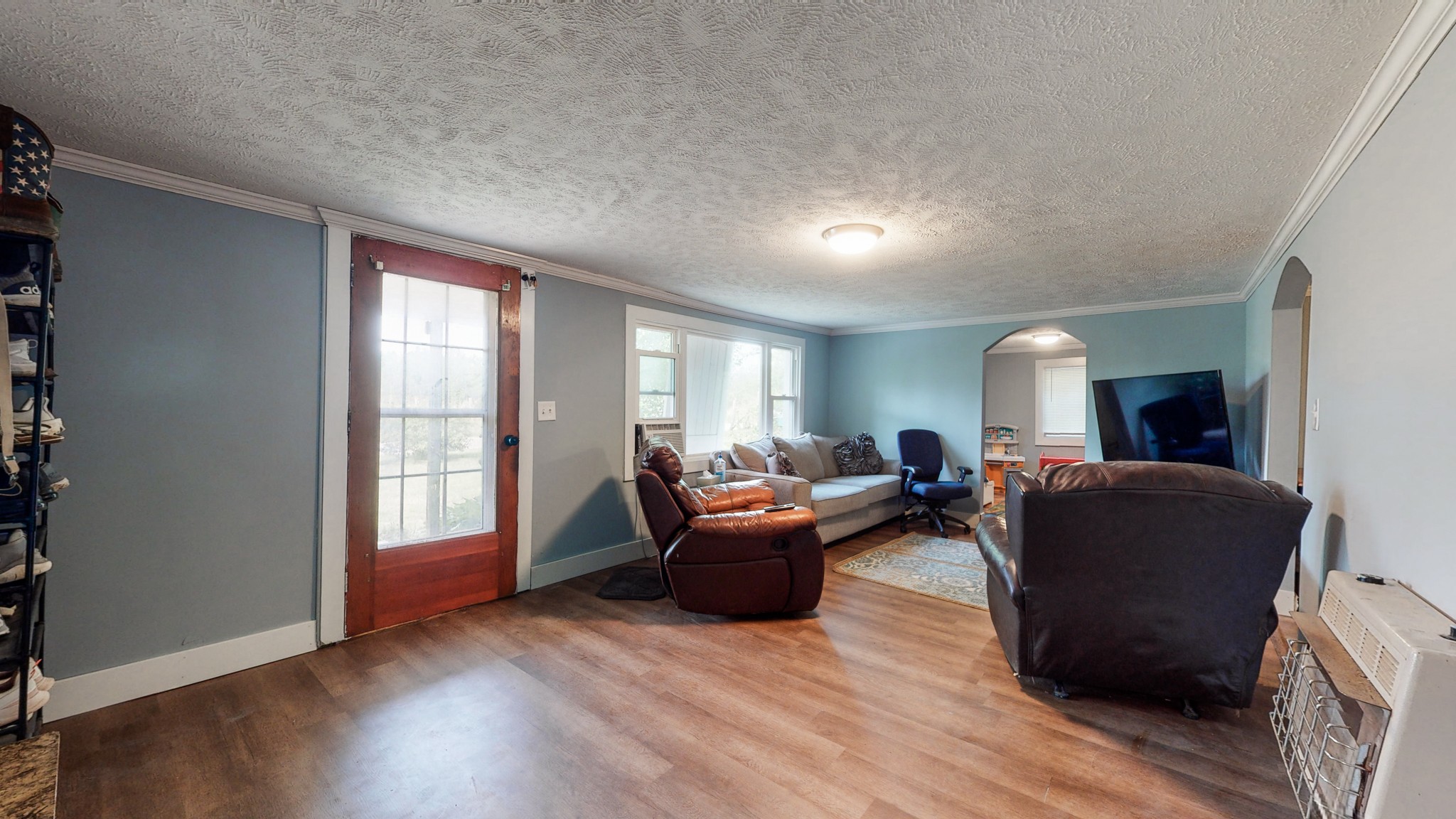2977 Old Stewart Road Tennessee Ridge, TN 37178 - Photo 7 of 40 a living room with furniture and a window