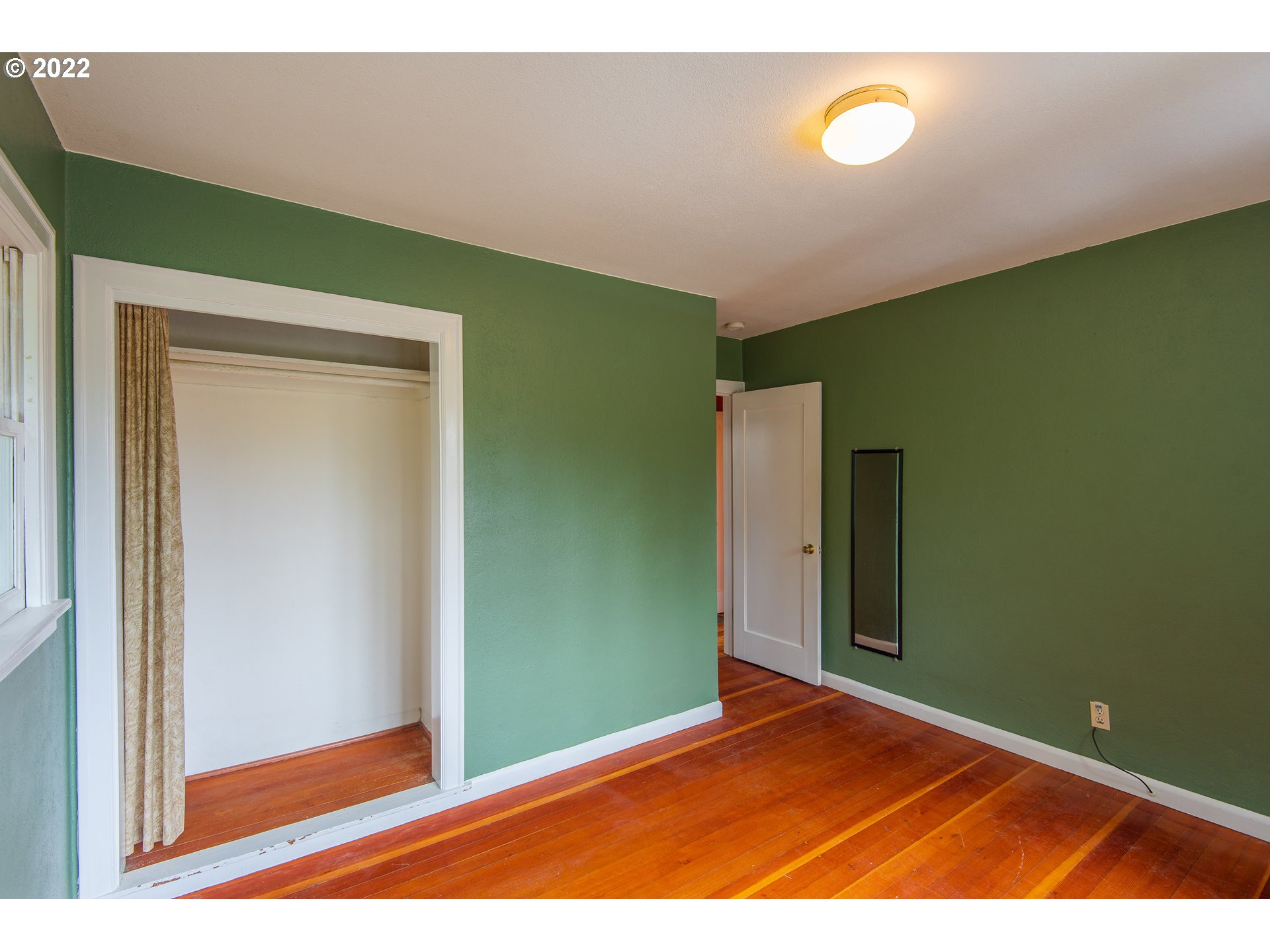 544 Clark Street North Bend, OR 97459 - Photo 13 of 32 a view of a room with wooden floor