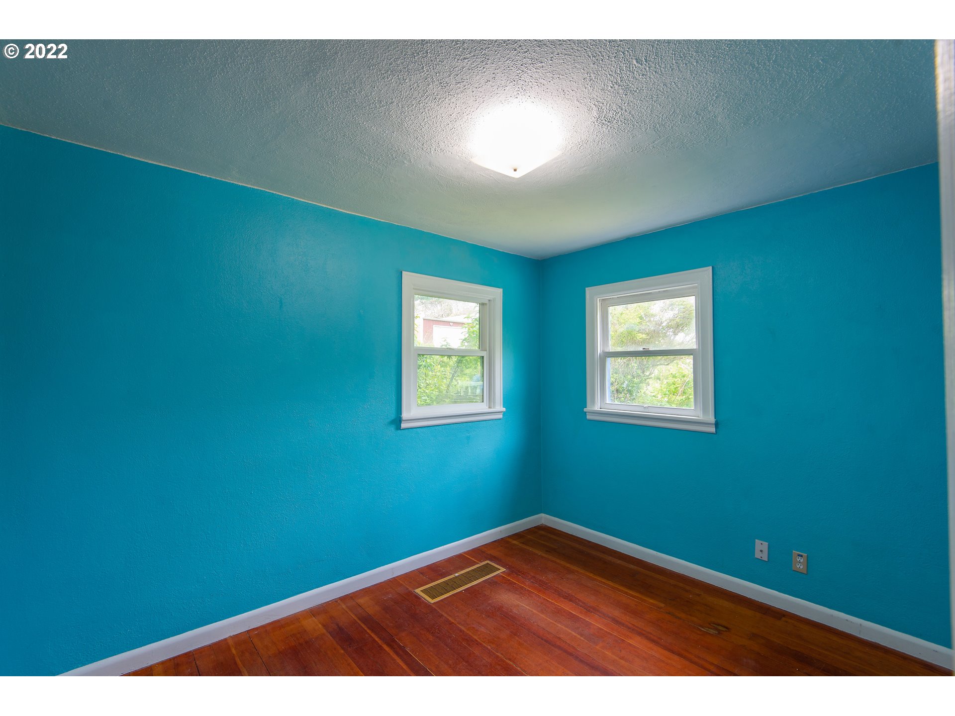 544 Clark Street North Bend, OR 97459 - Photo 14 of 32 a view of an empty room with a window