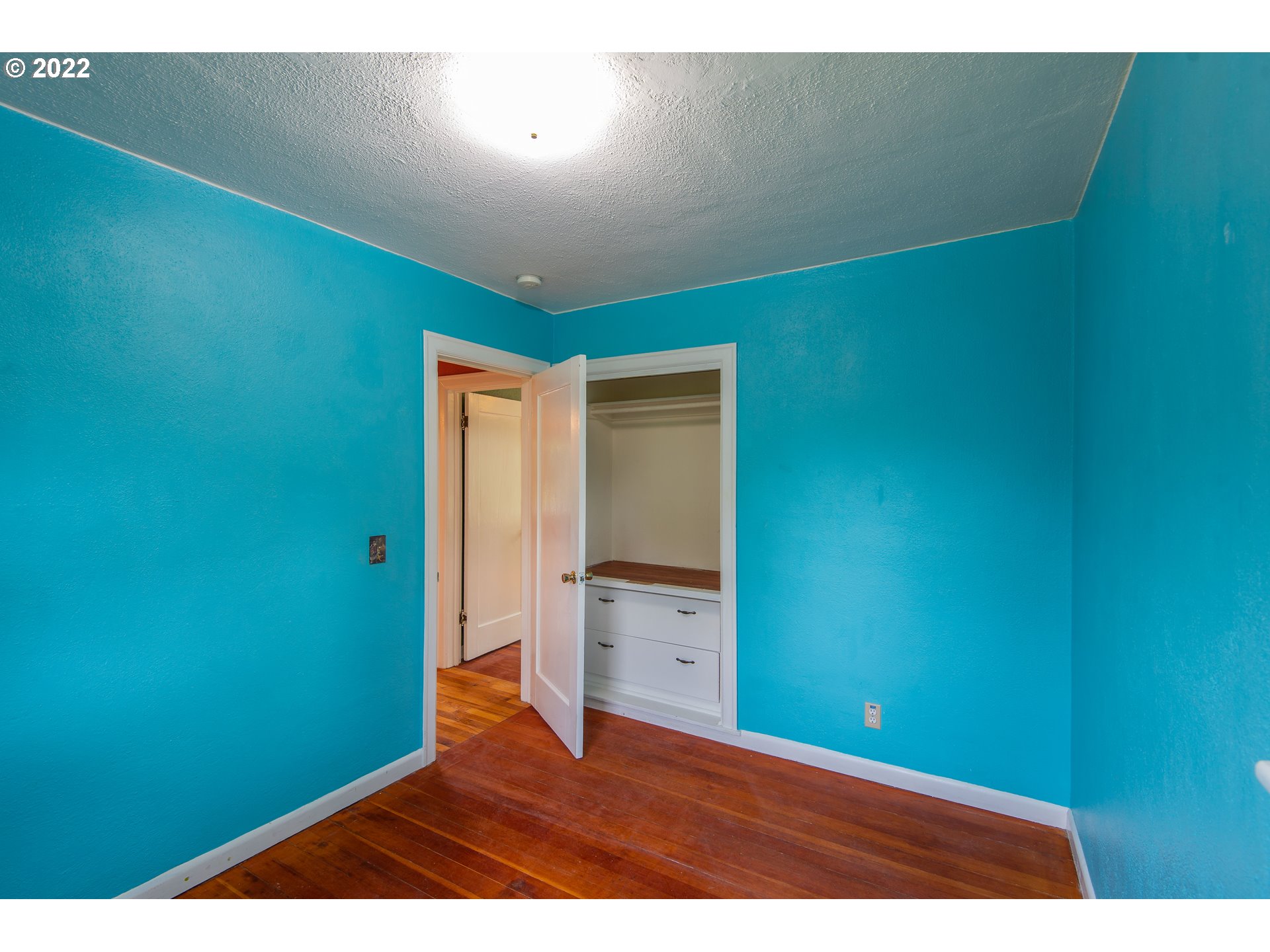 544 Clark Street North Bend, OR 97459 - Photo 15 of 32 a view of room with wooden floor
