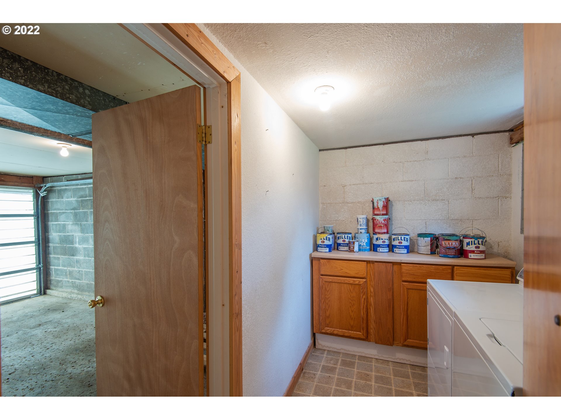 544 Clark Street North Bend, OR 97459 - Photo 30 of 32 a kitchen with a refrigerator and sink