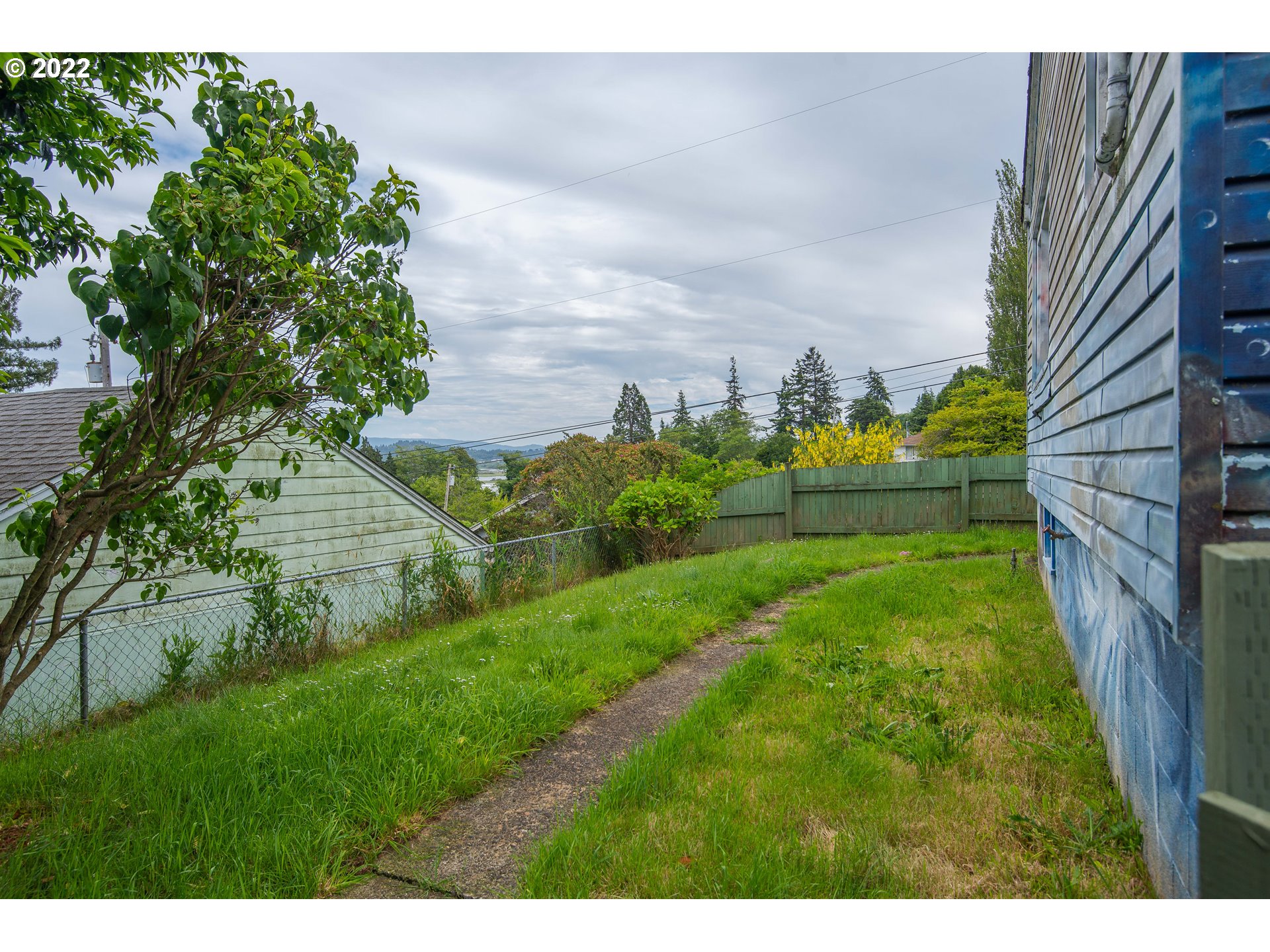 544 Clark Street North Bend, OR 97459 - Photo 3 of 32 a view of a yard in front of a house