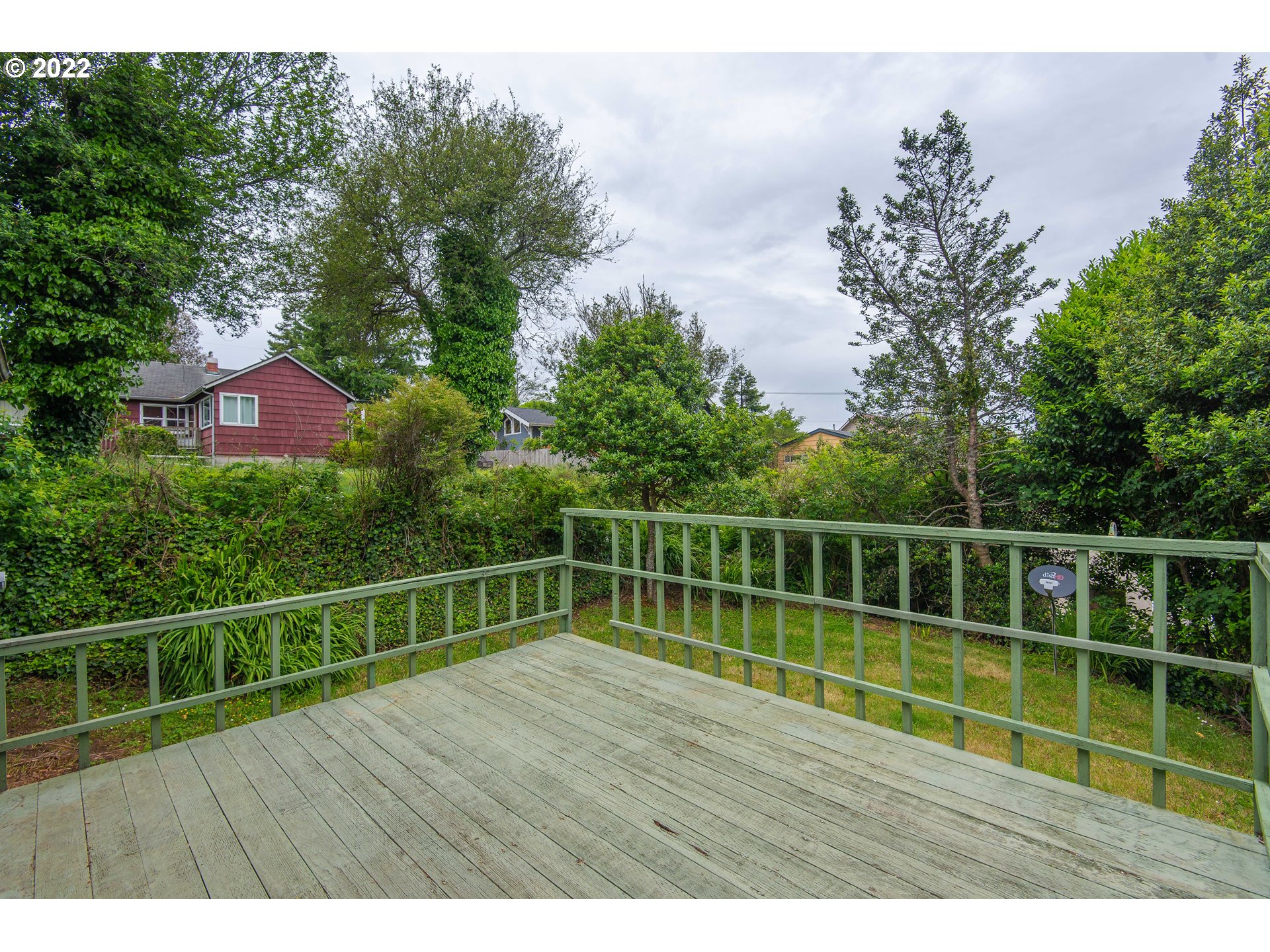 544 Clark Street North Bend, OR 97459 - Photo 5 of 32 a view of a balcony with yard