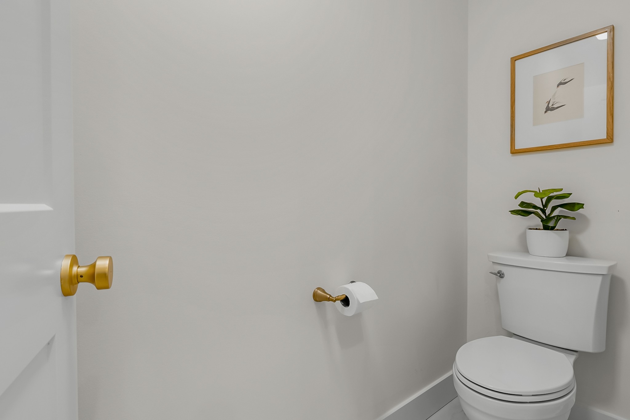 1629 Cairo Road Gallatin, TN 37066 - Photo 32 of 60 a white toilet sitting next to a white wall