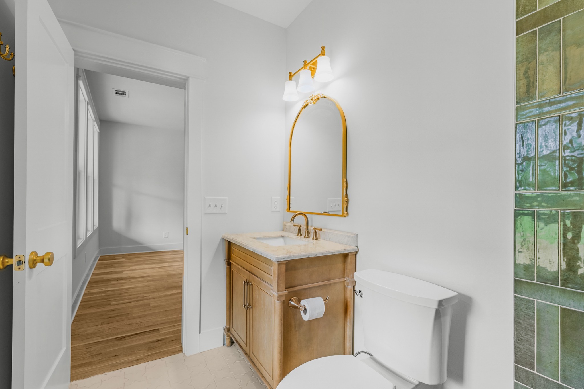 1629 Cairo Road Gallatin, TN 37066 - Photo 40 of 60 a bathroom with a sink mirror vanity and toilet