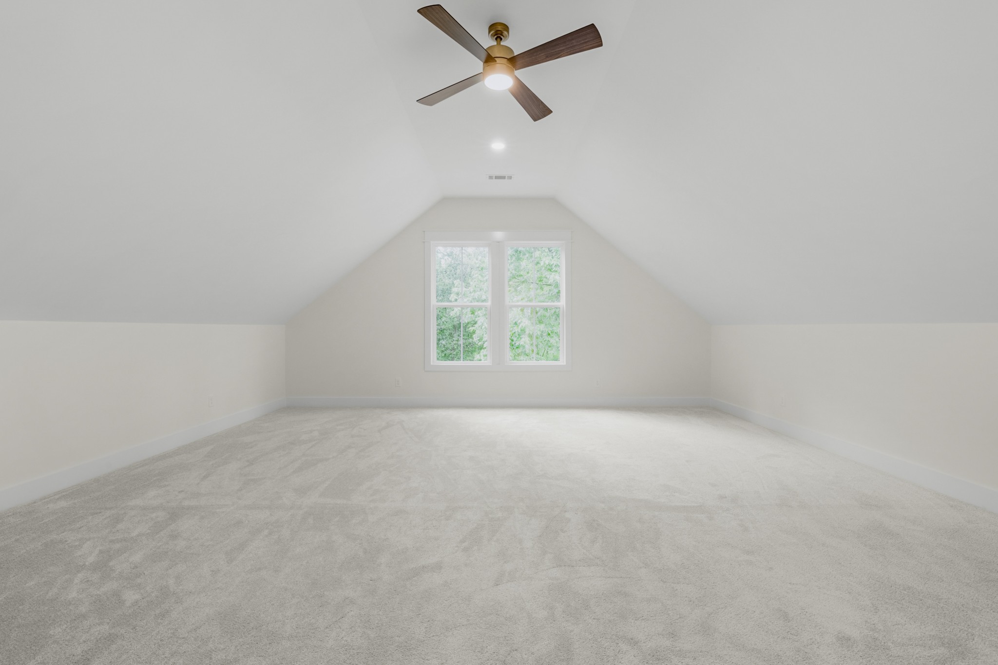 1629 Cairo Road Gallatin, TN 37066 - Photo 52 of 60 an empty room with a window and a ceiling fan