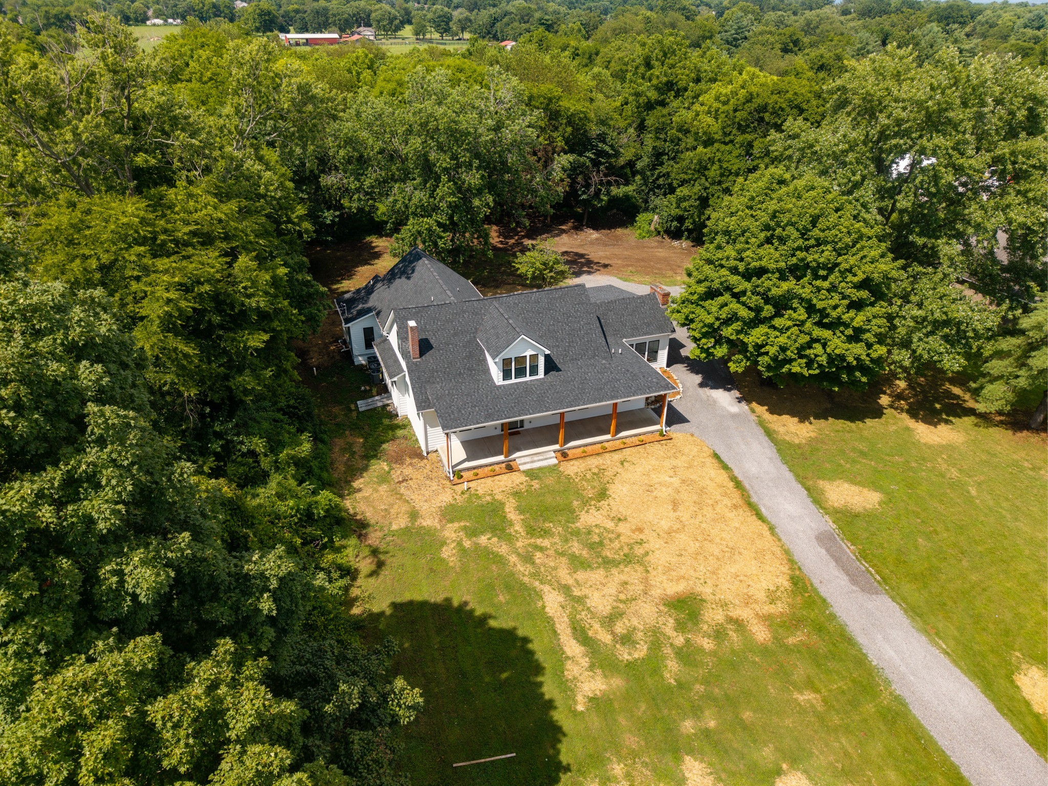 1629 Cairo Road Gallatin, TN 37066 - Photo 58 of 60 a view of a swimming pool with an outdoor space and seating area