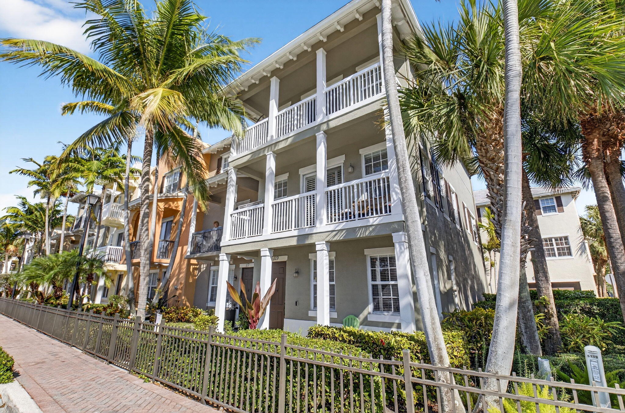 119 Southwest 2nd Avenue Delray Beach, FL 33444 - Photo 3 of 63 a view of a brick building next to a yard