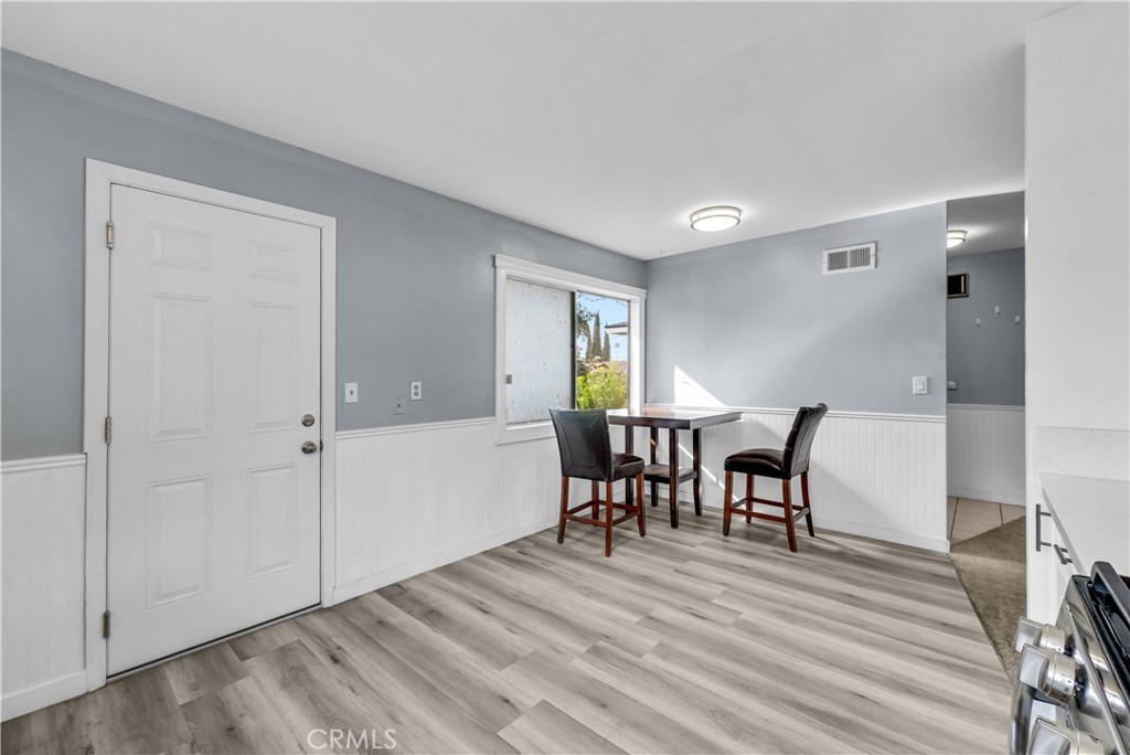 8682 La Grande Street Rancho Cucamonga, CA 91701 - Photo 12 of 29 a view of a room with furniture and wooden floor
