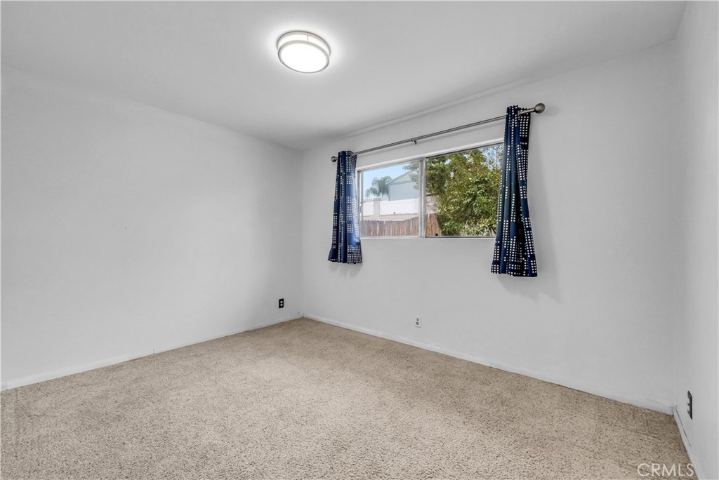 8682 La Grande Street Rancho Cucamonga, CA 91701 - Photo 18 of 29 an empty room with windows