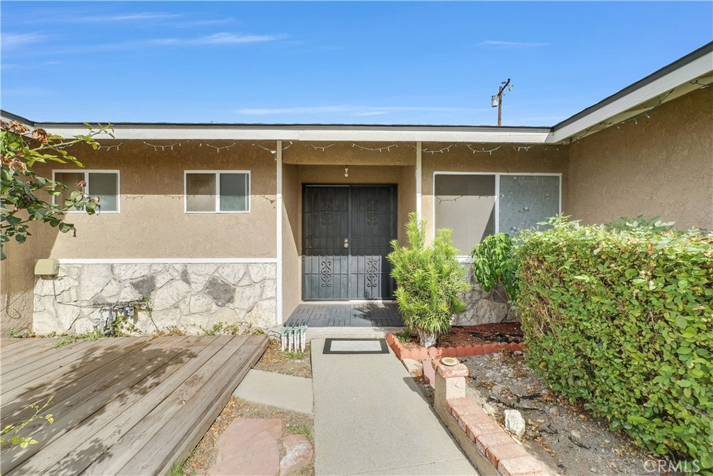 8682 La Grande Street Rancho Cucamonga, CA 91701 - Photo 2 of 29 front view of a house with a large window