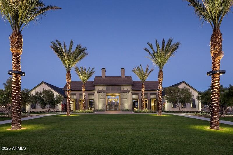 2232 West Chisum Trail Phoenix, AZ 85085 - Photo 11 of 75 a front view of a house with a garden and trees