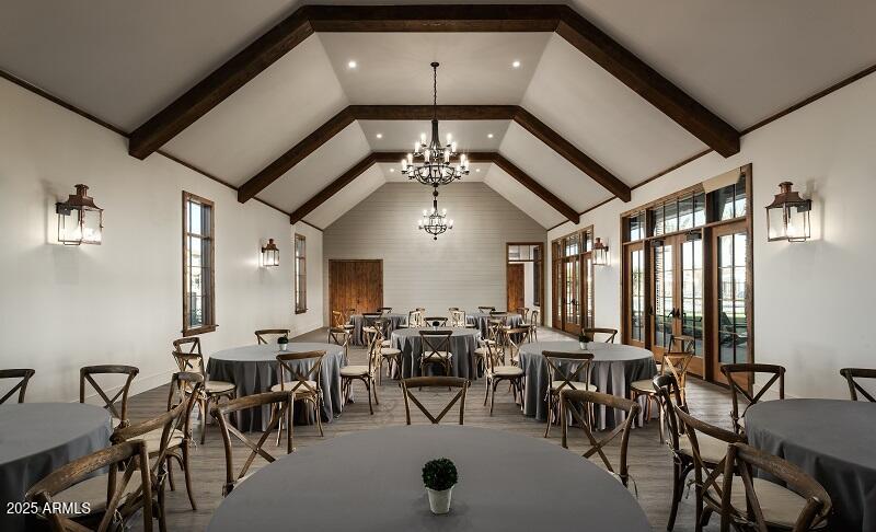 2232 West Chisum Trail Phoenix, AZ 85085 - Photo 16 of 75 a view of a dining area with furniture and chandelier