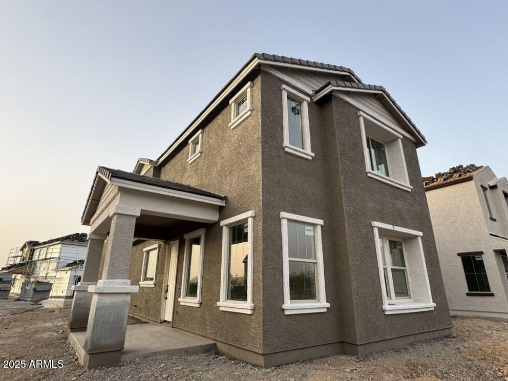 2232 West Chisum Trail Phoenix, AZ 85085 - Photo 4 of 75 a front view of a house with stairs