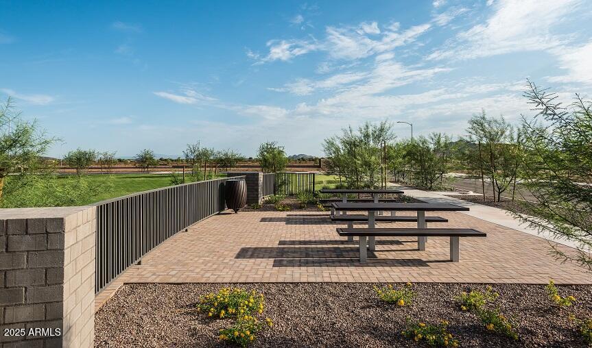 2232 West Chisum Trail Phoenix, AZ 85085 - Photo 59 of 75 a view of a terrace with a bench