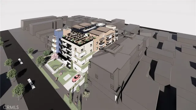 an aerial view of multiple houses with yard