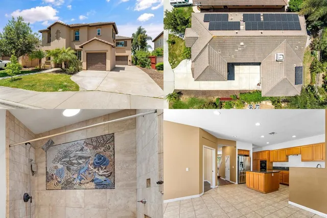 a aerial view of a house with a yard