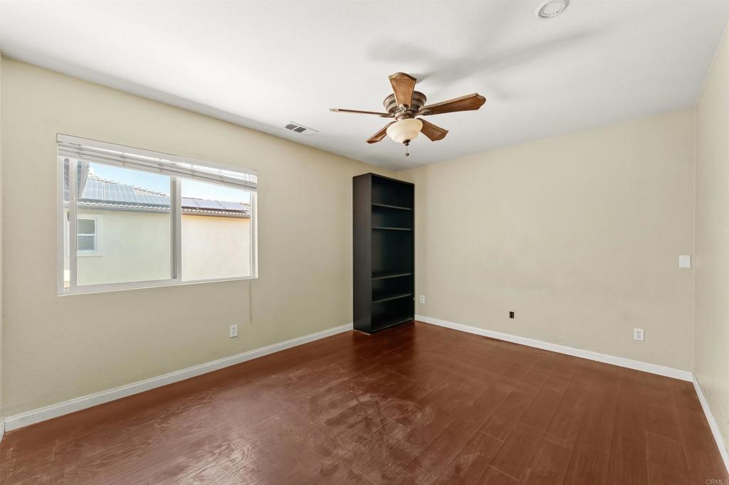 1049 Boulder Place Oceanside, CA 92057 - Photo 24 of 49 a view of an empty room with a window