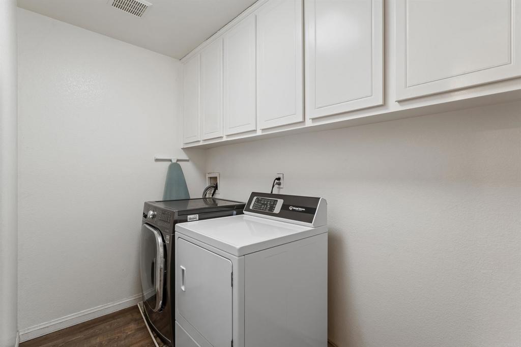 1049 Boulder Place Oceanside, CA 92057 - Photo 25 of 49 a utility room with dryer and washer