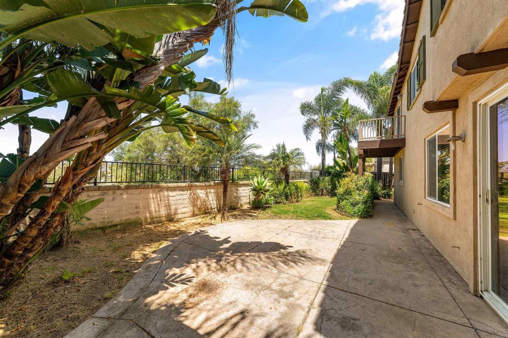 1049 Boulder Place Oceanside, CA 92057 - Photo 35 of 49 a view of a pathway of a house with a yard