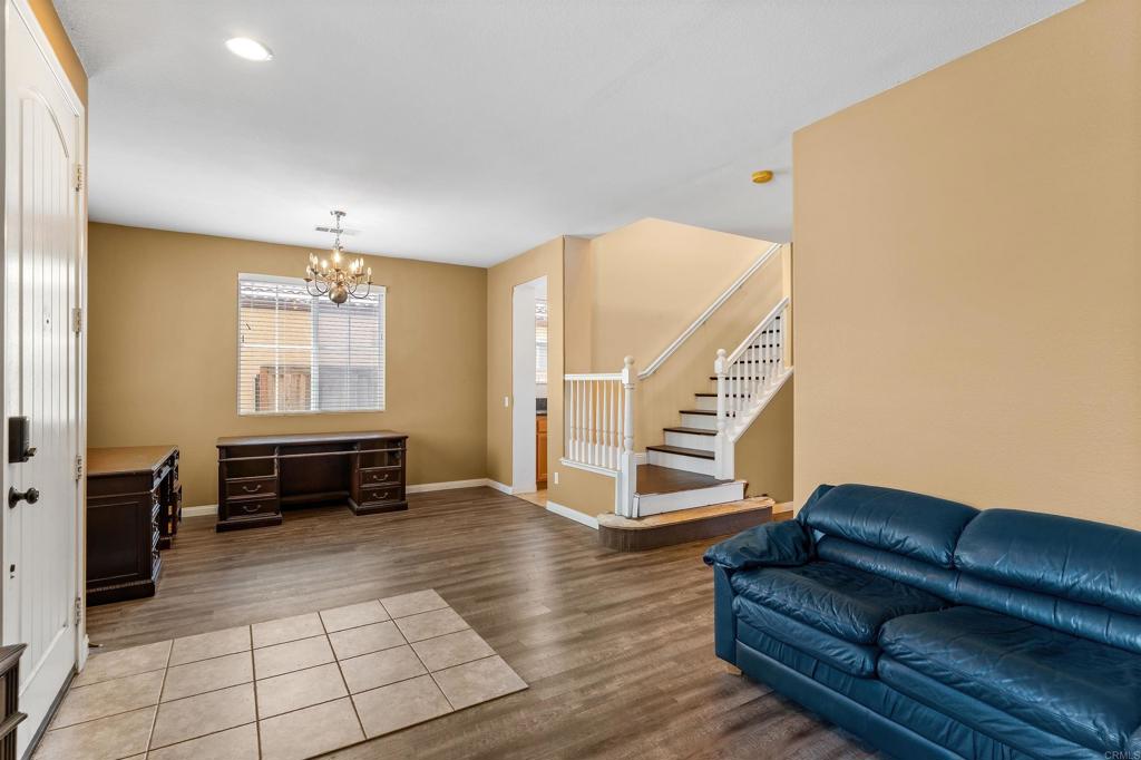 1049 Boulder Place Oceanside, CA 92057 - Photo 42 of 49 a living room with furniture and a window