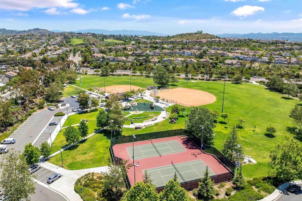 1049 Boulder Place Oceanside, CA 92057 - Photo 49 of 49 an aerial view of residential houses with outdoor space and trees