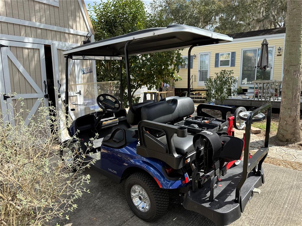 2875 Northeast 102nd Ave Road Silver Springs, FL 34488 - Photo 36 of 68 a view of car parked in front of house