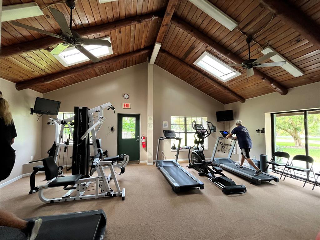 2875 Northeast 102nd Ave Road Silver Springs, FL 34488 - Photo 42 of 68 a view of a room with gym equipment