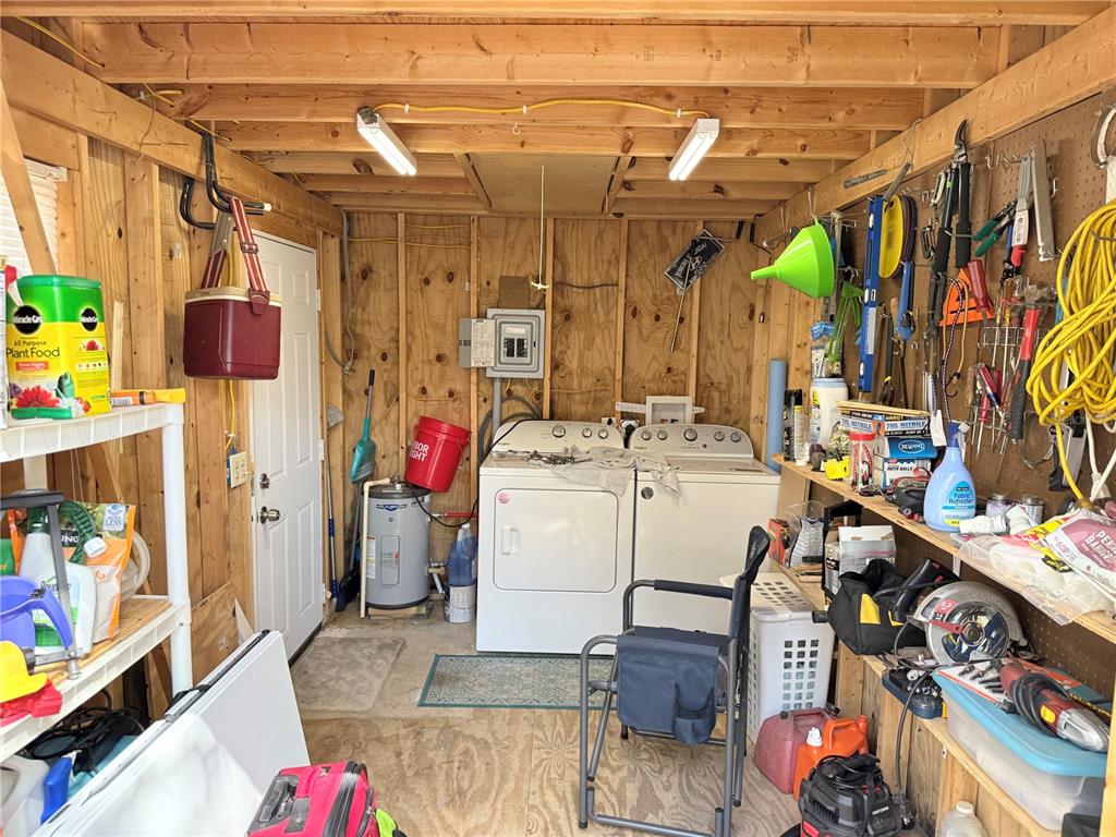 2875 Northeast 102nd Ave Road Silver Springs, FL 34488 - Photo 10 of 68 a utility room with lot of items