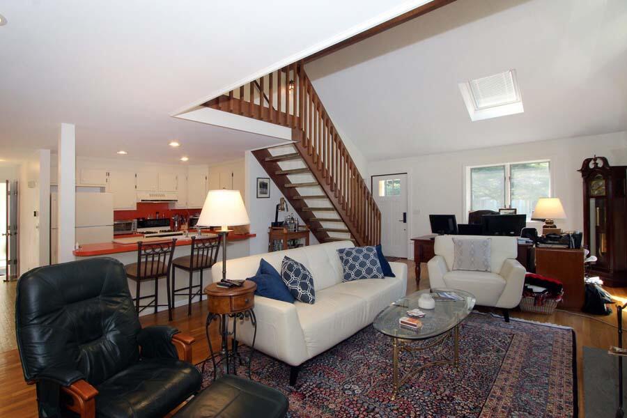 136 West Way Mashpee, MA 02649 - Photo 9 of 30 a living room with furniture and wooden floor