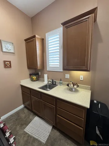a bathroom with a double vanity sink and mirror