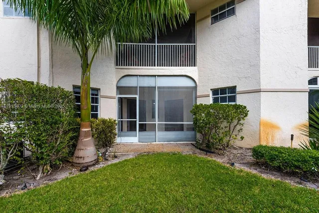 a view of a house with a park
